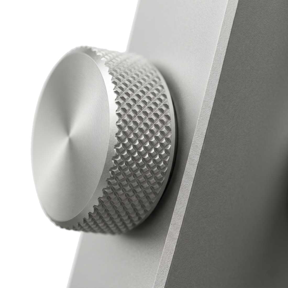 Macro photograph of the knurled aluminium dial